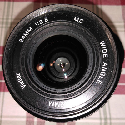 the Vivitar 24mm f/2.8, Cosina-made, front