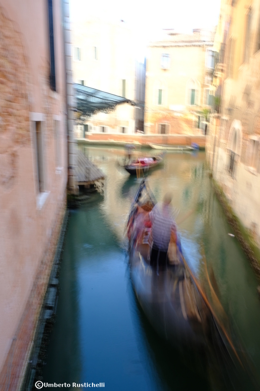 Venice, long exposure shot: gondolas and rowers