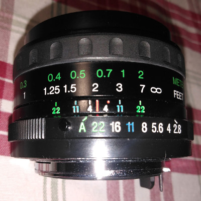 the Vivitar 24mm f/2.8, Cosina-made, side